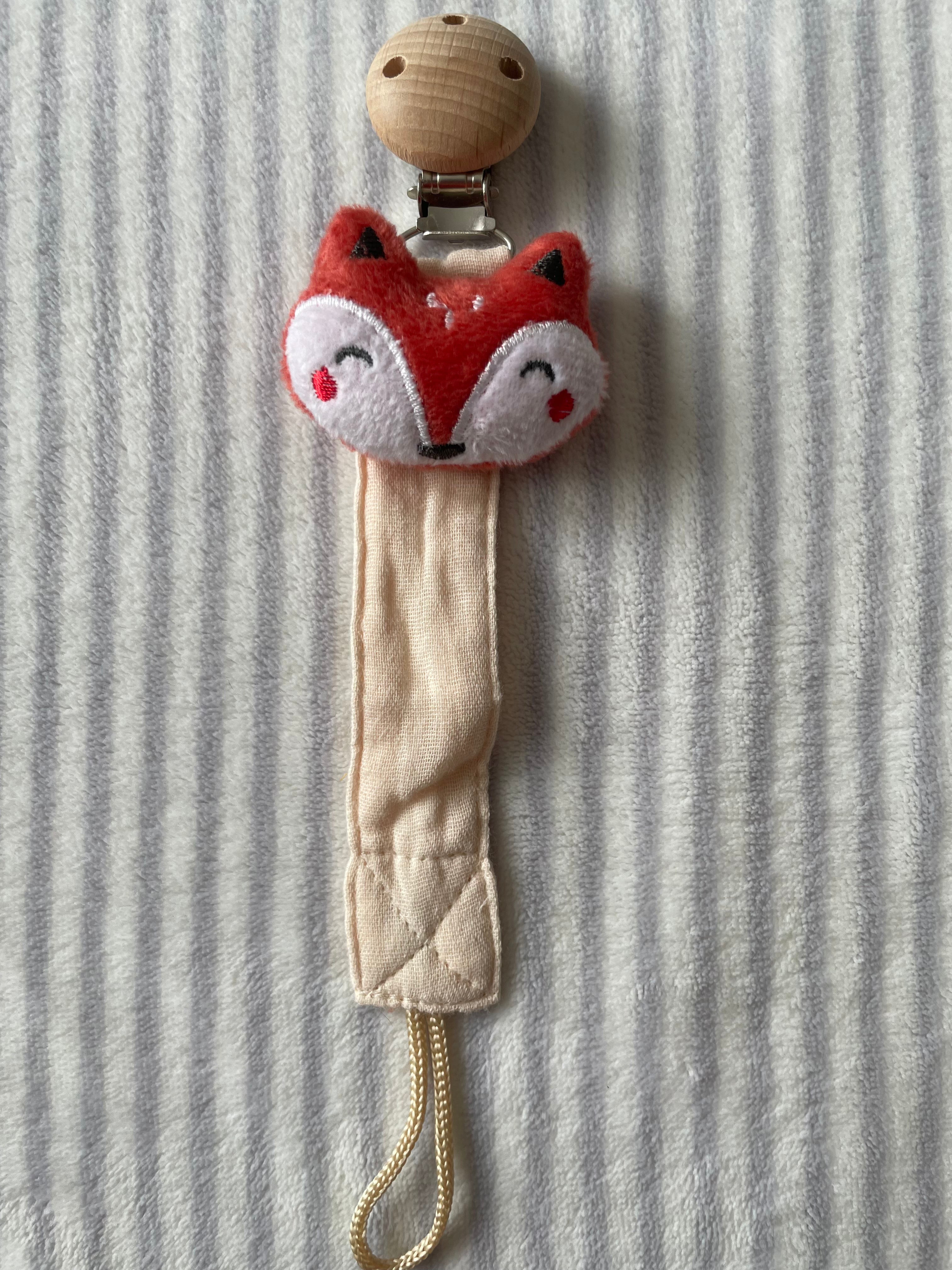 Attache tétine bébé en bois de hêtre & mousseline de coton – renard, chat, lion ou abeille